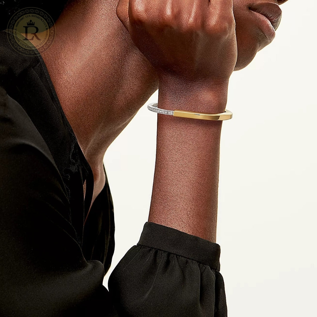 Bracelet Tiffany Lock en or jaune et blanc avec demi-pavé de diamants