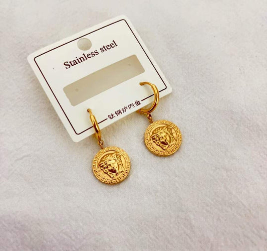 Boucles d'oreilles acier doré VERSACE