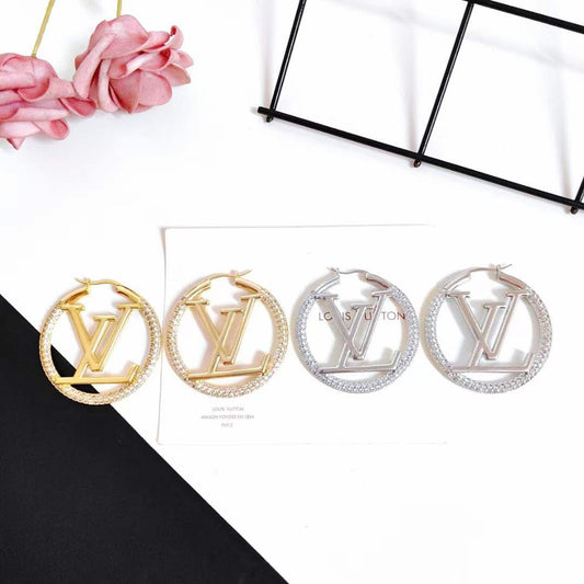 Boucles d'oreilles LOUIS VUITTON strass