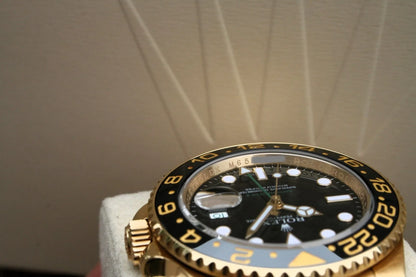 Rolex GMT-Master II 116718LN Yellow Gold Black Dial Oyster