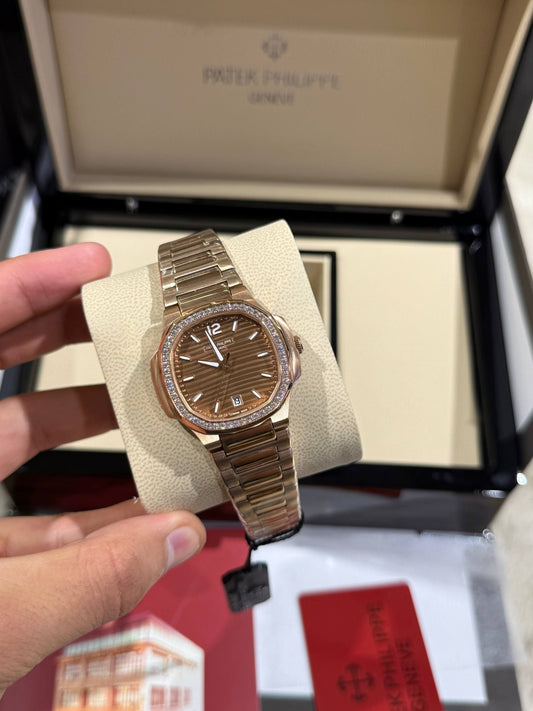 Patek Philippe femme Bronze serti chocolat