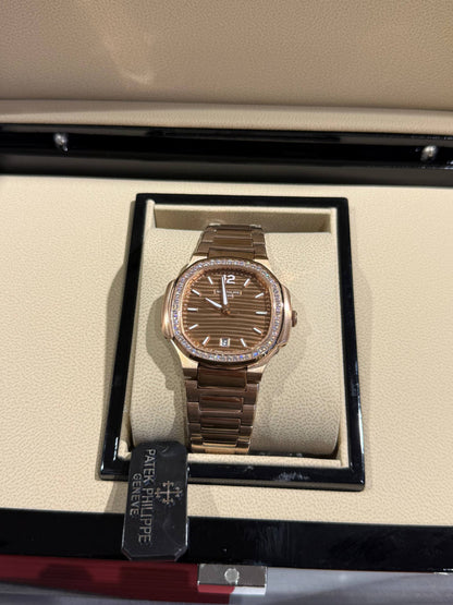 Patek Philippe femme Bronze serti chocolat