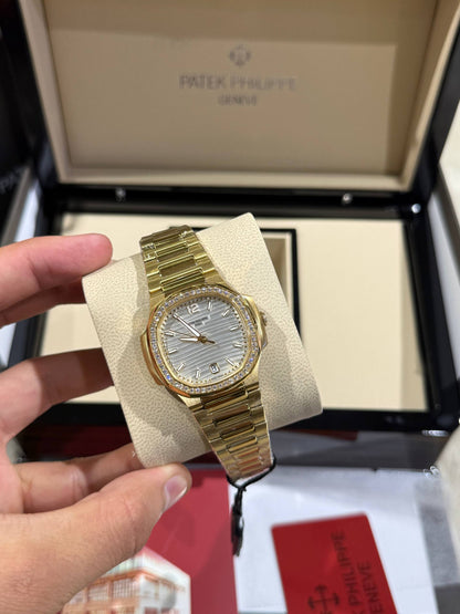 Patek Philippe femme gold serti gris