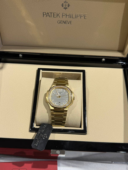 Patek Philippe femme gold serti gris