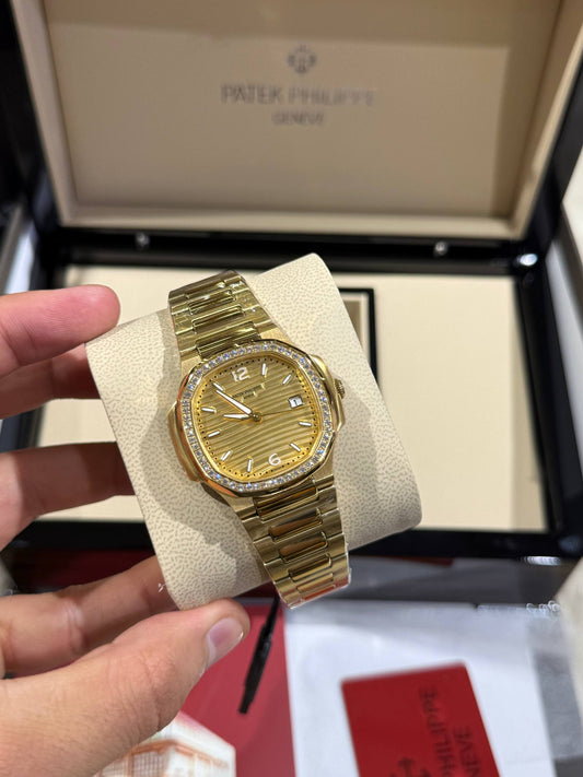 Patek Philippe femme Gold serti gold