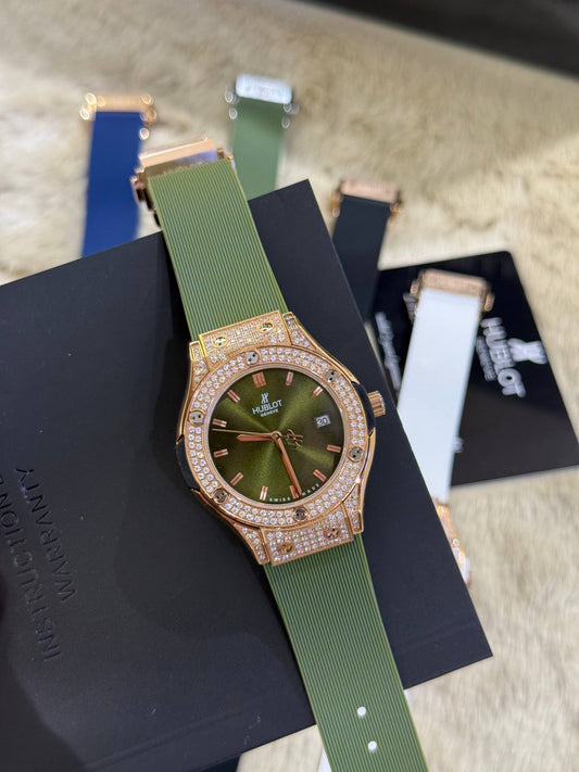 HUBLOT femme full serti vert / or rose
